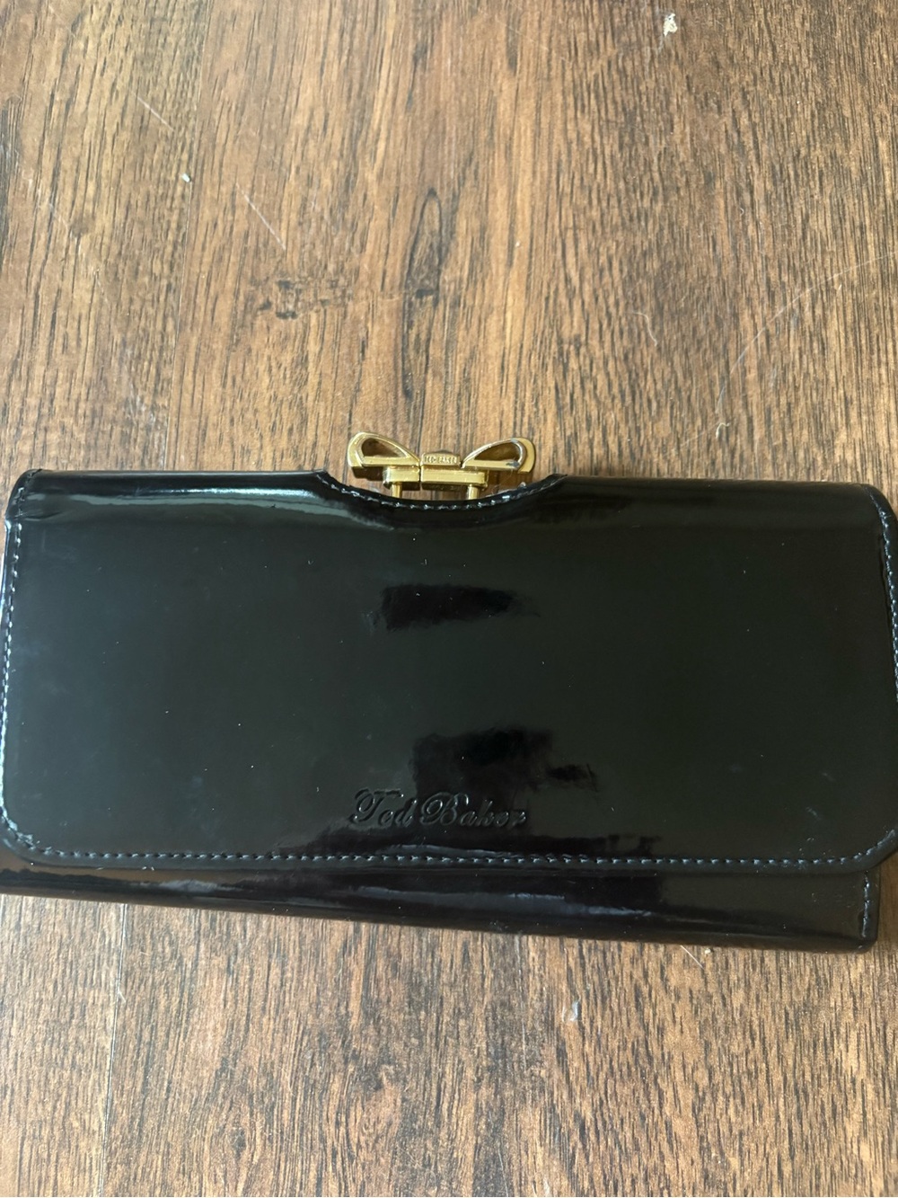 Ted Baker Black Patent Wallet with Gold Bow Accent